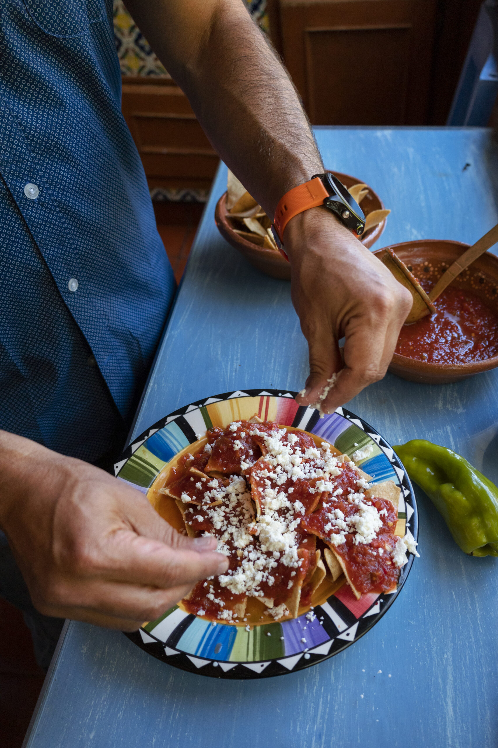 high-angle-hands-preparing-meal